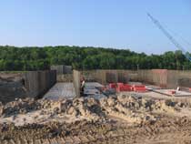 Reinforcing steel placement for concrete basin walls, De Soto, Kansas